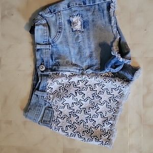 Decorative girls Jean shorts. Size girls 16. Like new.